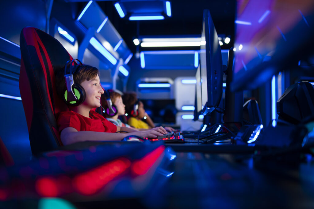 group-children-gamers-playing-computer-video-games-game-room
